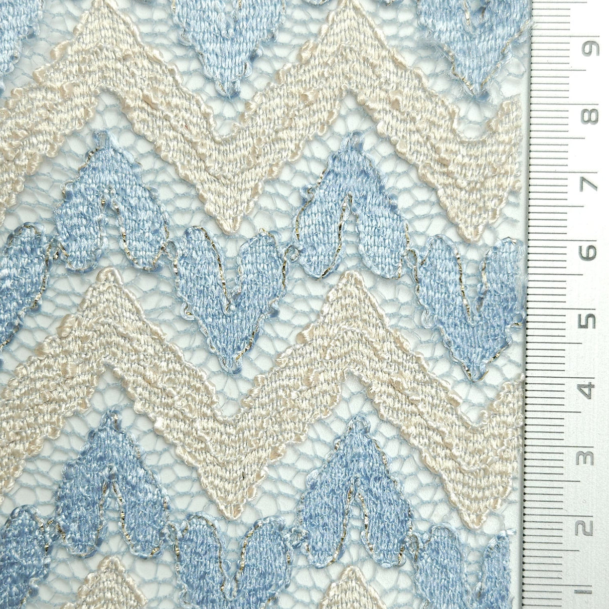 Solid Chevron Lace Polyester Nylon Spandex Knit Fabric | FAB1581 | 1.Polo Blue, 2.Moon Mist, 3.Shadow Green, 4.White, 5.Mercury, 6.Kangaroo, 7.Catalina Blue, 8.Dark Chestnut, 9.Bright Red, 10.Facebook Blue by Fabricis.com #