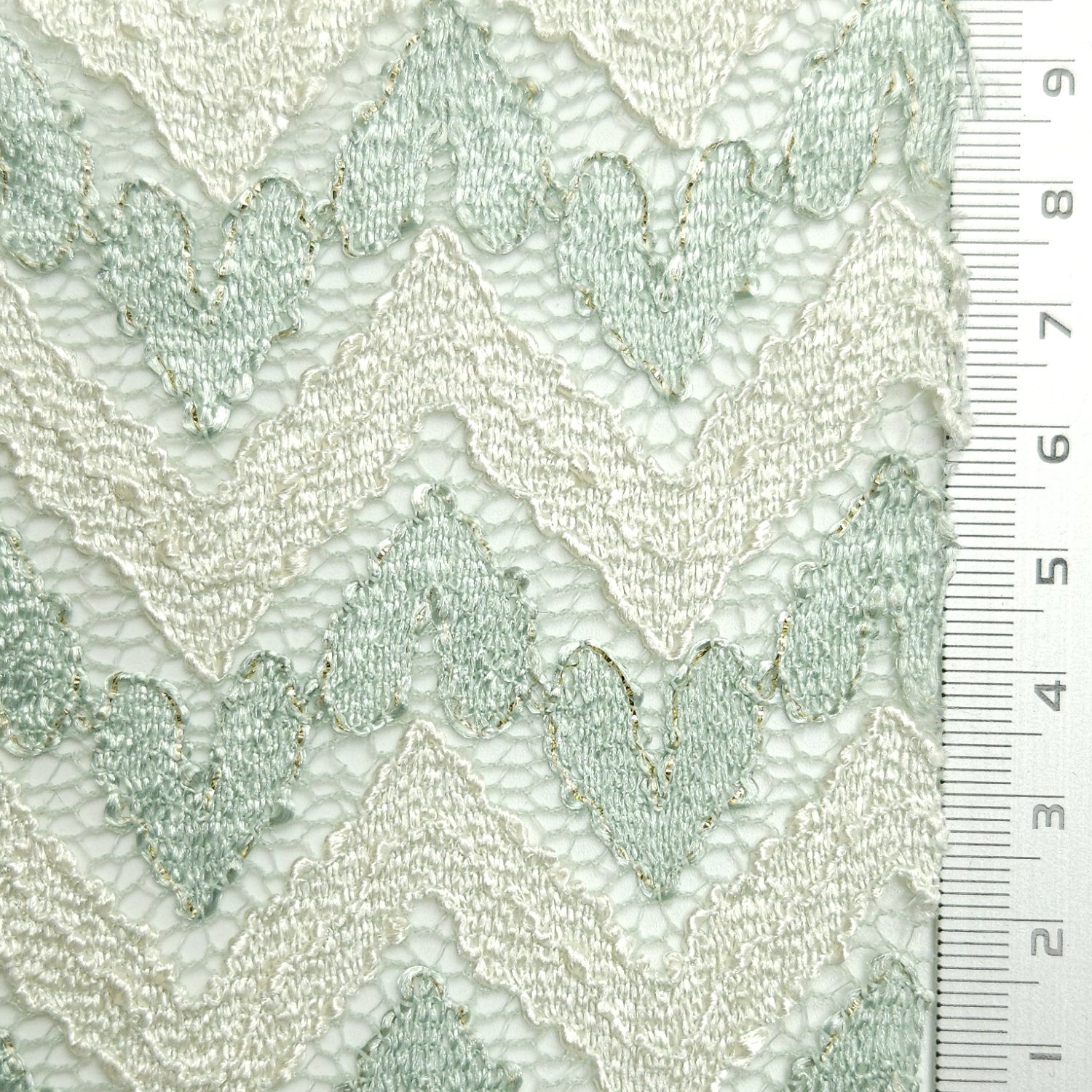 Solid Chevron Lace Polyester Nylon Spandex Knit Fabric | FAB1581 | 1.Polo Blue, 2.Moon Mist, 3.Shadow Green, 4.White, 5.Mercury, 6.Kangaroo, 7.Catalina Blue, 8.Dark Chestnut, 9.Bright Red, 10.Facebook Blue by Fabricis.com #