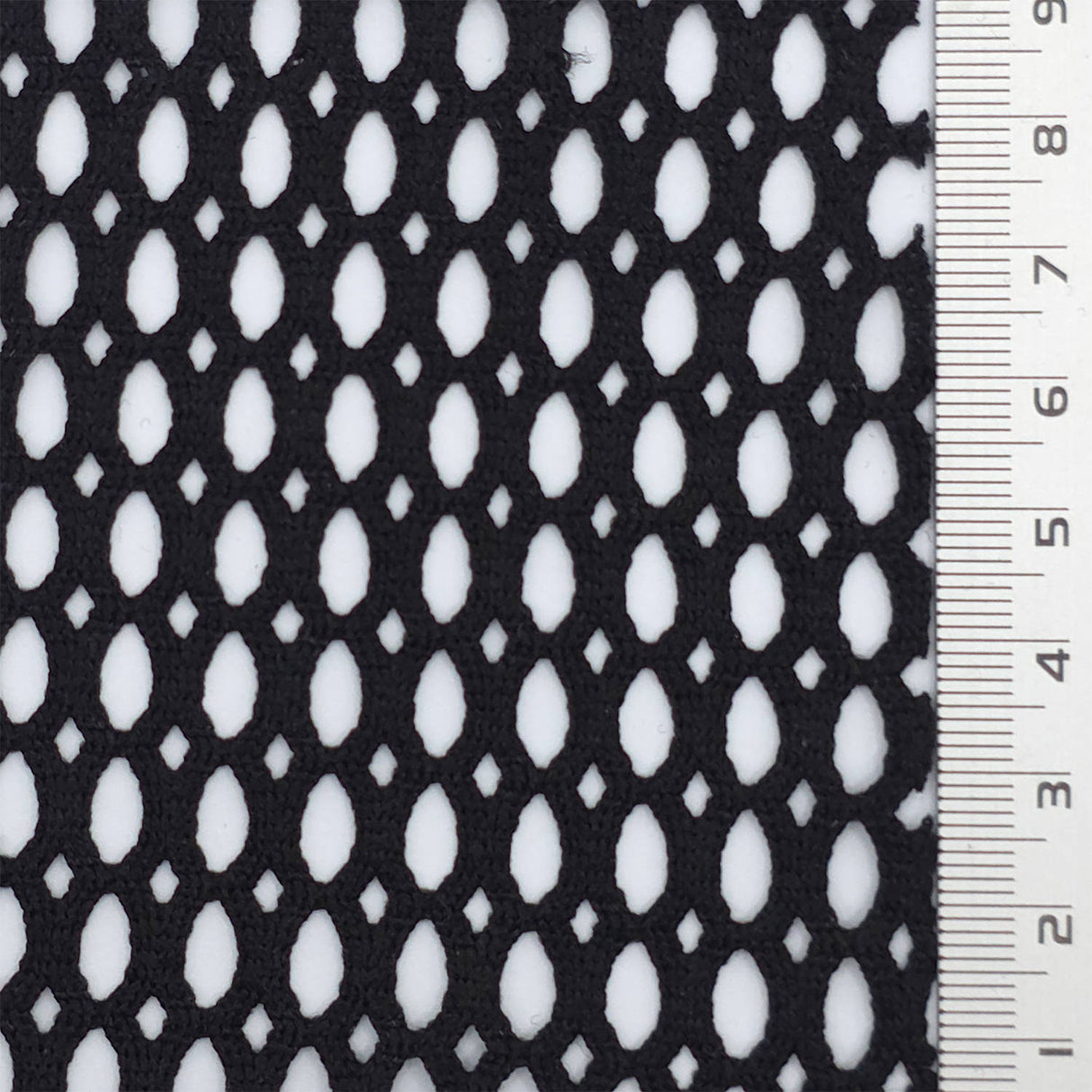 Black Textured Mesh Poly Knit Fabric - FAB1848